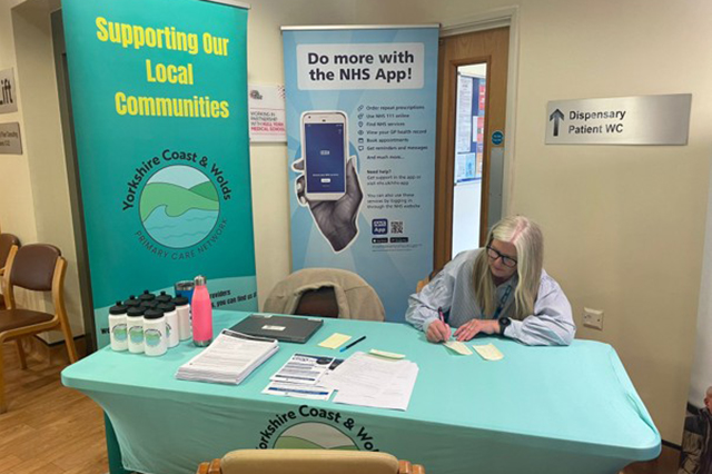 Dsiplay and table at NHS App drop-in event